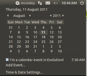 The indicator-datetime applet on the Ubuntu desktop, opened to show the calendar, and some events from the calendar